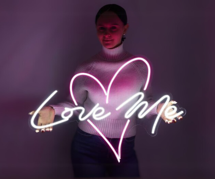 Neon sign Sizes and Dimensions: Which Neon Size Is Right For You? 3 Cute girl holding love me neon led sign size standart - neon sign sizes